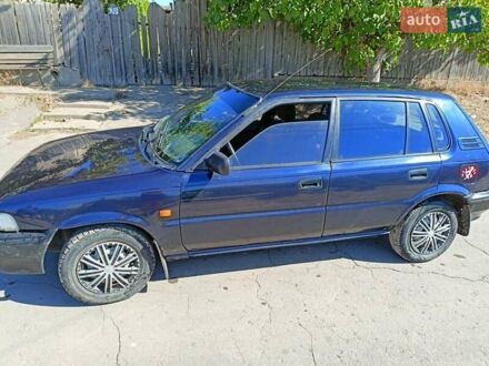 Синій Тойота Королла, об'ємом двигуна 1.3 л та пробігом 500 тис. км за 1399 $, фото 1 на Automoto.ua