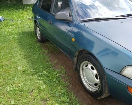 Синій Тойота Королла, об'ємом двигуна 1.3 л та пробігом 394 тис. км за 1750 $, фото 1 на Automoto.ua