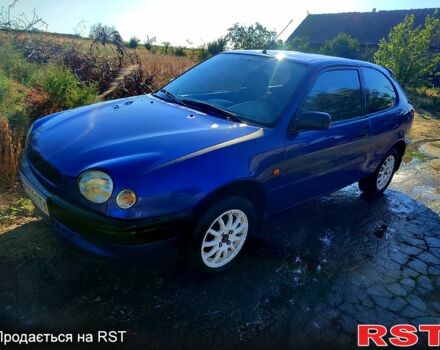 Синий Тойота Королла, объемом двигателя 1.3 л и пробегом 242 тыс. км за 3200 $, фото 1 на Automoto.ua