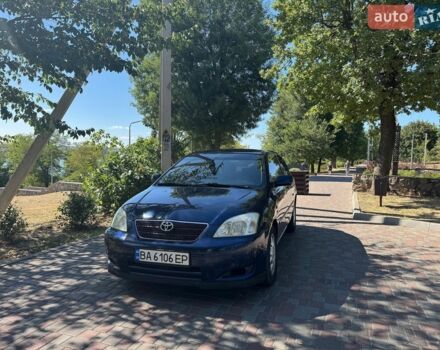 Синий Тойота Королла, объемом двигателя 2 л и пробегом 309 тыс. км за 4500 $, фото 1 на Automoto.ua