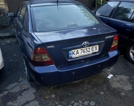 Синий Тойота Королла, объемом двигателя 1.4 л и пробегом 250 тыс. км за 1200 $, фото 1 на Automoto.ua