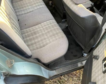 Зеленый Тойота Королла, объемом двигателя 1.3 л и пробегом 319 тыс. км за 800 $, фото 6 на Automoto.ua