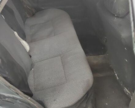 Зеленый Тойота Королла, объемом двигателя 1.3 л и пробегом 200 тыс. км за 400 $, фото 6 на Automoto.ua