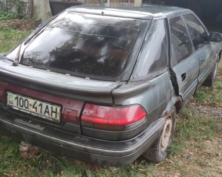 Зеленый Тойота Королла, объемом двигателя 1.3 л и пробегом 200 тыс. км за 400 $, фото 4 на Automoto.ua