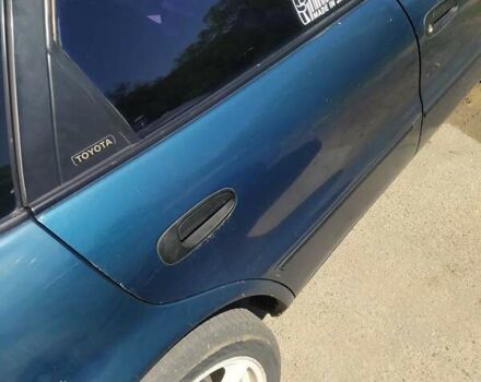 Зелений Тойота Королла, об'ємом двигуна 2.02 л та пробігом 400 тис. км за 1200 $, фото 2 на Automoto.ua