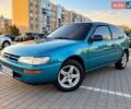 Зеленый Тойота Королла, объемом двигателя 1.33 л и пробегом 350 тыс. км за 2000 $, фото 1 на Automoto.ua