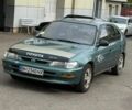 Зеленый Тойота Королла, объемом двигателя 1.33 л и пробегом 350 тыс. км за 2850 $, фото 1 на Automoto.ua