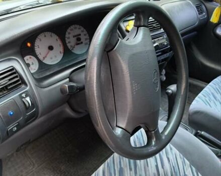 Зеленый Тойота Королла, объемом двигателя 1.3 л и пробегом 400 тыс. км за 2500 $, фото 11 на Automoto.ua