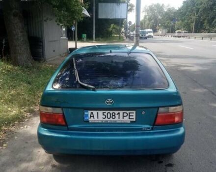 Зеленый Тойота Королла, объемом двигателя 1.3 л и пробегом 400 тыс. км за 2500 $, фото 4 на Automoto.ua