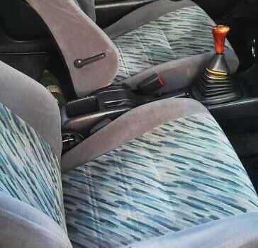 Зеленый Тойота Королла, объемом двигателя 1.3 л и пробегом 250 тыс. км за 1700 $, фото 11 на Automoto.ua