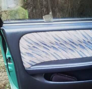 Зеленый Тойота Королла, объемом двигателя 1.3 л и пробегом 250 тыс. км за 1700 $, фото 12 на Automoto.ua