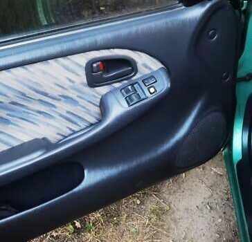 Зеленый Тойота Королла, объемом двигателя 1.3 л и пробегом 250 тыс. км за 1700 $, фото 16 на Automoto.ua