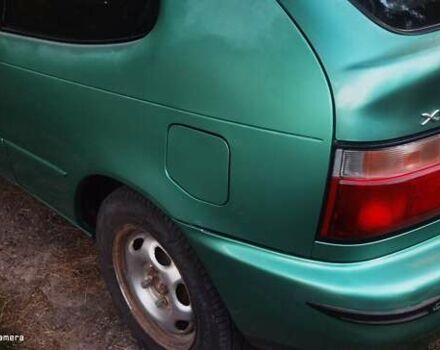 Зеленый Тойота Королла, объемом двигателя 1.3 л и пробегом 250 тыс. км за 1700 $, фото 6 на Automoto.ua