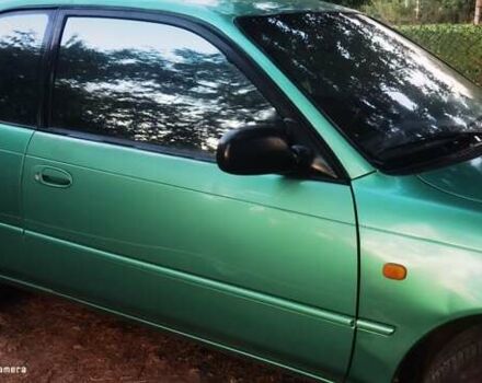 Зеленый Тойота Королла, объемом двигателя 1.3 л и пробегом 250 тыс. км за 1700 $, фото 7 на Automoto.ua