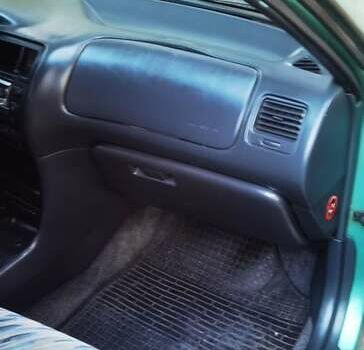 Зеленый Тойота Королла, объемом двигателя 1.3 л и пробегом 250 тыс. км за 1700 $, фото 10 на Automoto.ua