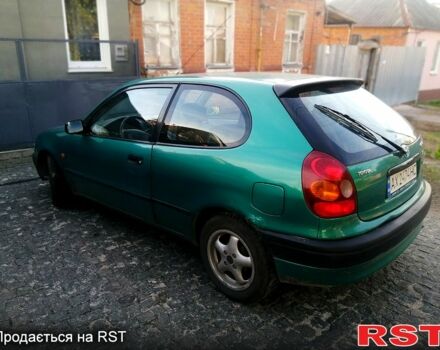 Зелений Тойота Королла, об'ємом двигуна 1.3 л та пробігом 215 тис. км за 1850 $, фото 1 на Automoto.ua