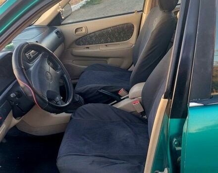 Зеленый Тойота Королла, объемом двигателя 1.6 л и пробегом 370 тыс. км за 3500 $, фото 7 на Automoto.ua