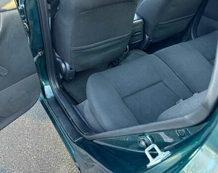 Зеленый Тойота Королла, объемом двигателя 1.6 л и пробегом 191 тыс. км за 5300 $, фото 15 на Automoto.ua