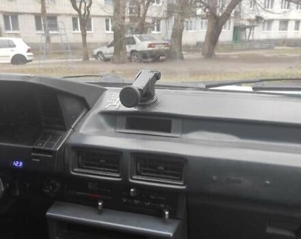 Зелений Тойота Королла, об'ємом двигуна 1.3 л та пробігом 298 тис. км за 1300 $, фото 7 на Automoto.ua