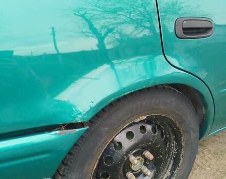 Зеленый Тойота Королла, объемом двигателя 1.6 л и пробегом 475 тыс. км за 2600 $, фото 6 на Automoto.ua