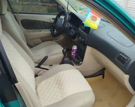 Зеленый Тойота Королла, объемом двигателя 1.6 л и пробегом 475 тыс. км за 2600 $, фото 9 на Automoto.ua