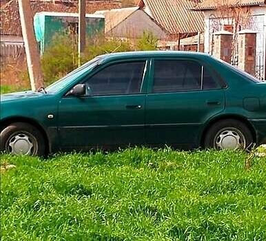 Зеленый Тойота Королла, объемом двигателя 1.4 л и пробегом 400 тыс. км за 4800 $, фото 1 на Automoto.ua