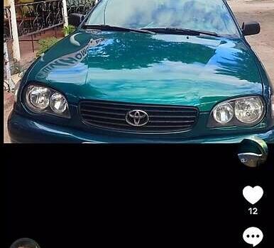 Зеленый Тойота Королла, объемом двигателя 1.4 л и пробегом 400 тыс. км за 4800 $, фото 11 на Automoto.ua