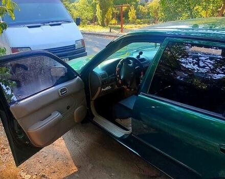 Зеленый Тойота Королла, объемом двигателя 1.4 л и пробегом 400 тыс. км за 4800 $, фото 3 на Automoto.ua