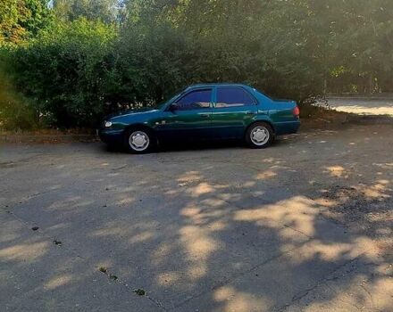 Зеленый Тойота Королла, объемом двигателя 1.4 л и пробегом 400 тыс. км за 4800 $, фото 5 на Automoto.ua