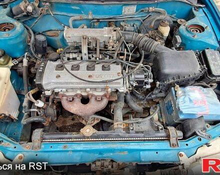 Зеленый Тойота Королла, объемом двигателя 1.3 л и пробегом 300 тыс. км за 3000 $, фото 6 на Automoto.ua