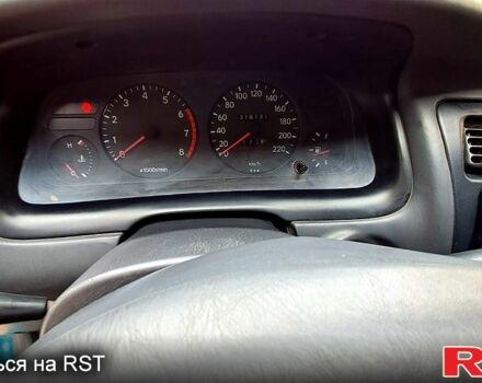 Зеленый Тойота Королла, объемом двигателя 1.3 л и пробегом 300 тыс. км за 3000 $, фото 7 на Automoto.ua