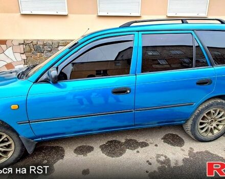 Зеленый Тойота Королла, объемом двигателя 1.3 л и пробегом 300 тыс. км за 3000 $, фото 2 на Automoto.ua