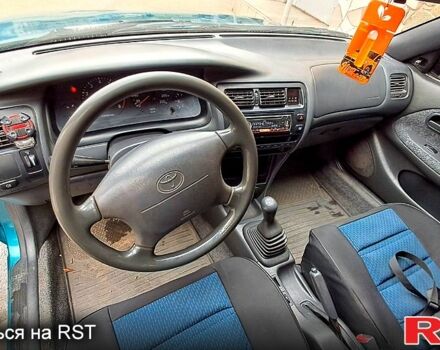 Зеленый Тойота Королла, объемом двигателя 1.3 л и пробегом 300 тыс. км за 3000 $, фото 4 на Automoto.ua