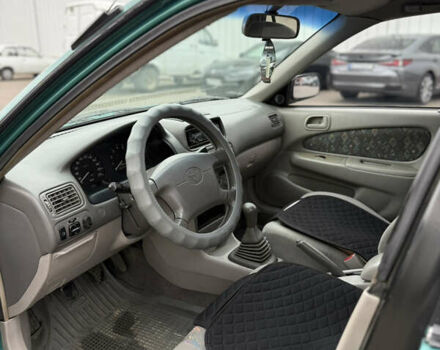 Зеленый Тойота Королла, объемом двигателя 1.33 л и пробегом 390 тыс. км за 3300 $, фото 4 на Automoto.ua