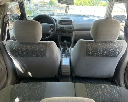 Зеленый Тойота Королла, объемом двигателя 1.3 л и пробегом 100 тыс. км за 3300 $, фото 5 на Automoto.ua