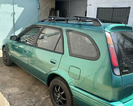 Зелений Тойота Королла, об'ємом двигуна 1.3 л та пробігом 400 тис. км за 3300 $, фото 3 на Automoto.ua