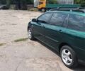 Зелений Тойота Королла, об'ємом двигуна 2 л та пробігом 270 тис. км за 2786 $, фото 12 на Automoto.ua