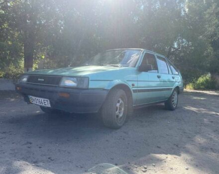 Зеленый Тойота Королла, объемом двигателя 1.3 л и пробегом 400 тыс. км за 710 $, фото 1 на Automoto.ua