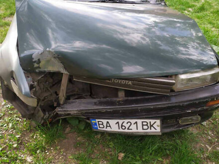 Зеленый Тойота Королла, объемом двигателя 1.3 л и пробегом 380 тыс. км за 400 $, фото 1 на Automoto.ua