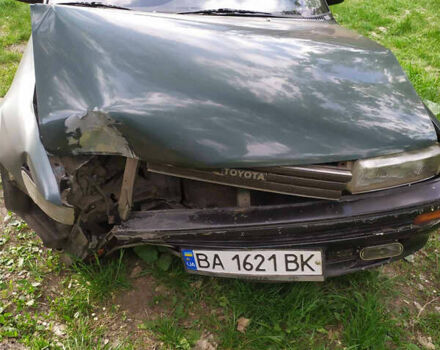 Зеленый Тойота Королла, объемом двигателя 1.3 л и пробегом 380 тыс. км за 400 $, фото 1 на Automoto.ua