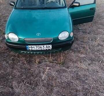 Зеленый Тойота Королла, объемом двигателя 1 л и пробегом 290 тыс. км за 2800 $, фото 1 на Automoto.ua