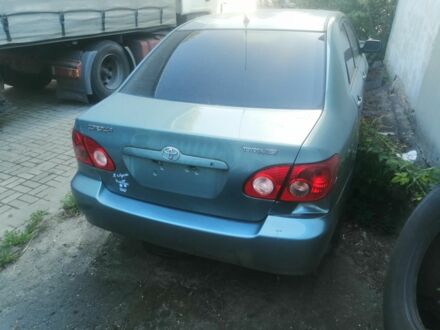 Зеленый Тойота Королла, объемом двигателя 1 л и пробегом 100 тыс. км за 500 $, фото 1 на Automoto.ua