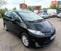 Чорний Тойота Естіма, об'ємом двигуна 2.4 л та пробігом 129 тис. км за 11880 $, фото 1 на Automoto.ua
