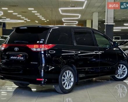 Черный Тойота Эстима, объемом двигателя 2.36 л и пробегом 128 тыс. км за 13999 $, фото 1 на Automoto.ua