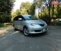 Серый Тойота Эстима, объемом двигателя 2.36 л и пробегом 185 тыс. км за 11700 $, фото 1 на Automoto.ua