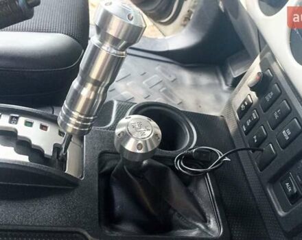 Белый Тойота ФЖ Крузер, объемом двигателя 4 л и пробегом 255 тыс. км за 21000 $, фото 12 на Automoto.ua