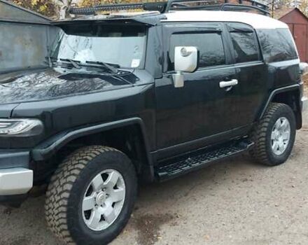Черный Тойота ФЖ Крузер, объемом двигателя 4 л и пробегом 350 тыс. км за 20000 $, фото 2 на Automoto.ua