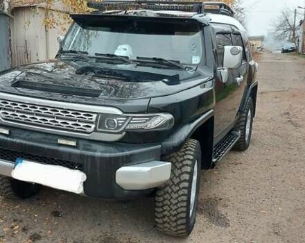 Черный Тойота ФЖ Крузер, объемом двигателя 4 л и пробегом 350 тыс. км за 20000 $, фото 1 на Automoto.ua