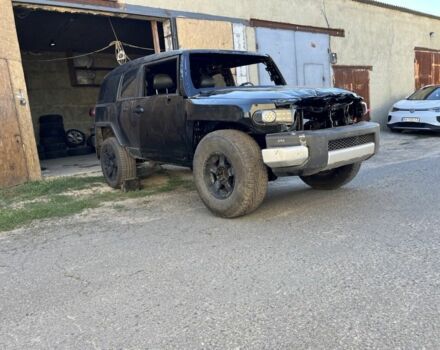 Черный Тойота ФЖ Крузер, объемом двигателя 4 л и пробегом 90 тыс. км за 5500 $, фото 1 на Automoto.ua