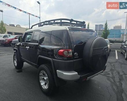 Черный Тойота ФЖ Крузер, объемом двигателя 4 л и пробегом 177 тыс. км за 16000 $, фото 2 на Automoto.ua